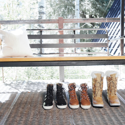 Bench with pillows and winter boots