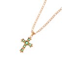 Green Gold Tone Cross Pendant Necklace with Green Gemstone Accents