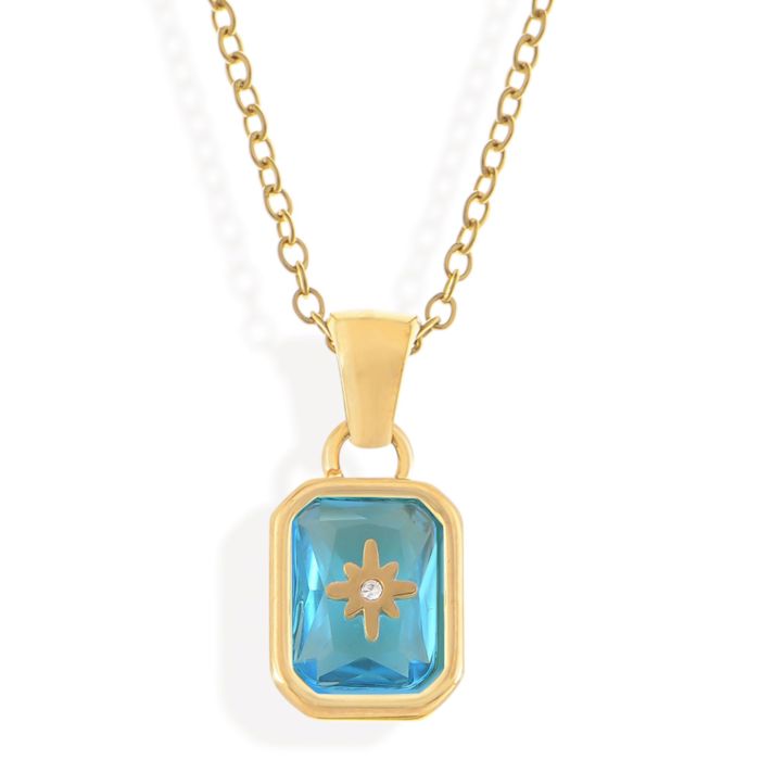 Gold Tone Pendant Necklace with Rectangular Crystal and Starburst Accent