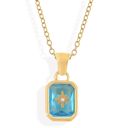 Yellow Gold Tone Pendant Necklace with Rectangular Crystal and Starburst Accent