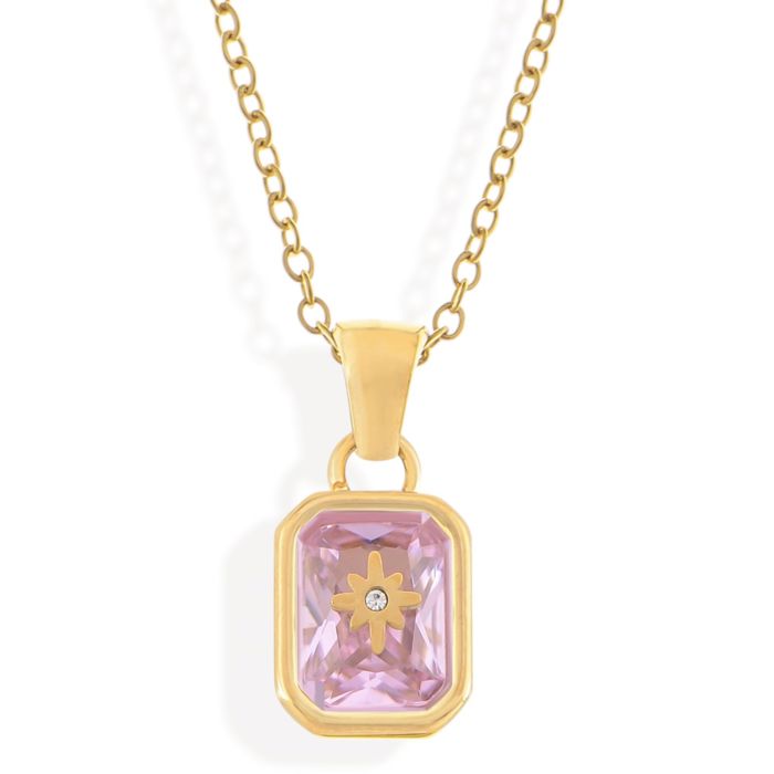 Gold Tone Pendant Necklace with Rectangular Crystal and Starburst Accent