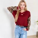  Crisscross V-Neck Top with Leopard Print Sleeves and Relaxed Fit