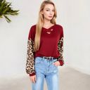  Crisscross V-Neck Top with Leopard Print Sleeves and Relaxed Fit