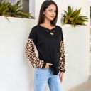 Black Large Crisscross V-Neck Top with Leopard Print Sleeves and Relaxed Fit