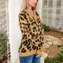  V-Neck Leopard Print Sweater with Cutout Detail and Long Sleeves