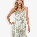  Sleeveless Printed Jumpsuit with V-Neck Ruffle Detail and Wide-Leg Pants