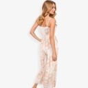 Beige Large Sleeveless Printed Jumpsuit with V-Neck Ruffle Detail and Wide-Leg Pants