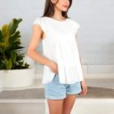 White Large Sleeveless Ruffled Babydoll Top with Tiered Peplum Hem and Crew Neck Casual Loose Fit Blouse