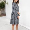  Long Sleeve Floral Print Dress with Ruffle Hem and Keyhole Neckline