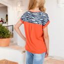  Short Sleeve Top with Rolled Cuffs and Zebra Print Front Pocket Detail