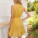 Yellow Medium Sleeveless High Neck Mini Dress with Ruffle Hem and Subtle Leopard Print