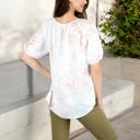 White Medium Floral Print Short Sleeve Blouse with Tassel Tie Neckline Relaxed Fit Casual Top