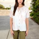 White Medium Floral Print Short Sleeve Blouse with Tassel Tie Neckline Relaxed Fit Casual Top