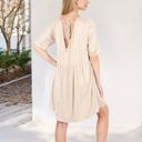 Beige Large V-Neck Short Sleeve Babydoll Dress with Flowing Silhouette