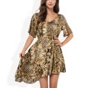  Animal Print High-Low Dress with Short Sleeves and V-Neckline Flowy Silhouette