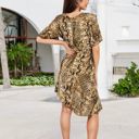  Animal Print High-Low Dress with Short Sleeves and V-Neckline Flowy Silhouette