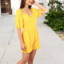  Sweetheart Neck Puff Sleeve Romper with Fitted Waist and Flowy Shorts for Casual or Dressy Looks