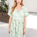  V-Neck Short Sleeve Floral Print Babydoll Dress with Button-Front