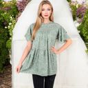 Green Large Short Sleeve Babydoll Blouse with Ruffled Hemline and Loose Fit for Effortless Casual Style