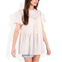 Pink Medium Short Sleeve Babydoll Blouse with Ruffled Hemline and Loose Fit for Effortless Casual Style