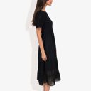 Black Large Short Sleeve Smocked Dress with Swiss Dot Pattern and Ruffle Hem Detail Casual Summer Dress