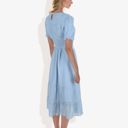 Blue Large Short Sleeve Smocked Dress with Swiss Dot Pattern and Ruffle Hem Detail Casual Summer Dress