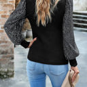 Black Large Ribbed Knit Top with Sequin Long Sleeves and Mock Neck Design