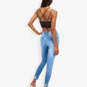 Blue Medium High Waist Skinny Jeans With Button Fly And Light Distressing