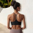 Black Large Women's Low Impact Racerback Sports Bra with Seamless Construction and Breathable Fabric