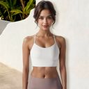 White Medium Women's Low Impact Racerback Sports Bra with Seamless Construction and Breathable Fabric