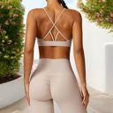 Beige Large Women's V-Neck Sports Bra with Adjustable Straps and Supportive Band