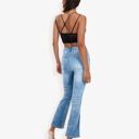  High Waist Light Wash Flare Jeans with Subtle Distressing