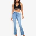  High Waist Light Wash Flare Jeans with Subtle Distressing