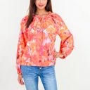 Orange Large Floral Print Peasant Blouse With Tassel Tie Neck And Long Sleeves