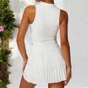 White Large Women's Sleeveless Polo Crop Top with Collared Neckline and Stretch Fabric