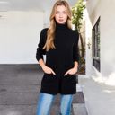 Black Large Ribbed Knit Turtleneck Tunic Sweater with Front Pockets