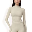 Beige Medium Women's High Neck Long Sleeve Active Top with Subtle Pattern