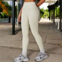 Beige Large Women's High Waist Seamless Leggings with Contoured Panels for Comfortable Stretch Fit