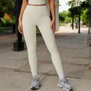 Beige Large Women's High Waist Seamless Leggings with Contoured Panels for Comfortable Stretch Fit