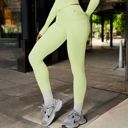 Green Large Women's High Waist Seamless Leggings with Contoured Panels for Comfortable Stretch Fit