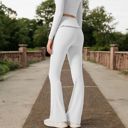 White XL Women's High-Waisted Flare Pants with Ruffle Waistband