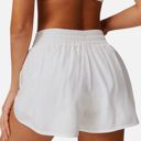 White Medium Women's High Waist Double Layered Running Shorts with Elastic Waistband and Curved Hem
