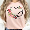 Large Peachy Christmas Nurse Stethoscope Graphic Tee, Holiday Graphic Shirt, Candy Cane  