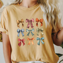 Medium Mustard Autumn Bow Grid Comfort Colors Tee, Fall Colored Coquette Bows Prnted Tee