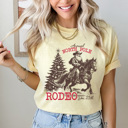 Medium Butter North Pole Rodeo Comfort Colors Tee, Holliday Graphic Tee, Santa, Horse, Cowoboy Shirt 