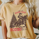 Large Mustard North Pole Rodeo Comfort Colors Tee, Holliday Graphic Tee, Santa, Horse, Cowoboy Shirt 