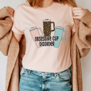 Small Peach Obsessive Cup Disorder Graphic Tee, Cute Cup Shirt, Crazy Cup Lady, Stanley Cup, Stanley Tumbler Shirt, Emotional Support Cup, Funny Graphic Tee