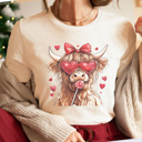 Large Cream Valentine Cow Graphic Tee, Highland Cow Shirt, Cute Valentine Graphic Tee, Valentine Shirt, Sucker For You