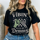 Medium Black Vibin With My Demons Graphic Tee, Halloween Graphic Tee, Trendy Halloween, Zombie Shirt, Skeleton Shirt