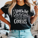 Large Black I Teach The Smartest Cookies Graphic Tee, Teacher Christmas Shirt, Cute Teacher Tee, Educator Christmas Shirt, Teacher Christmas Gift, Gingerbread Men Shirt, Smart Cookie Shirt